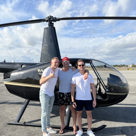 friends on a helicopter ride in Miami